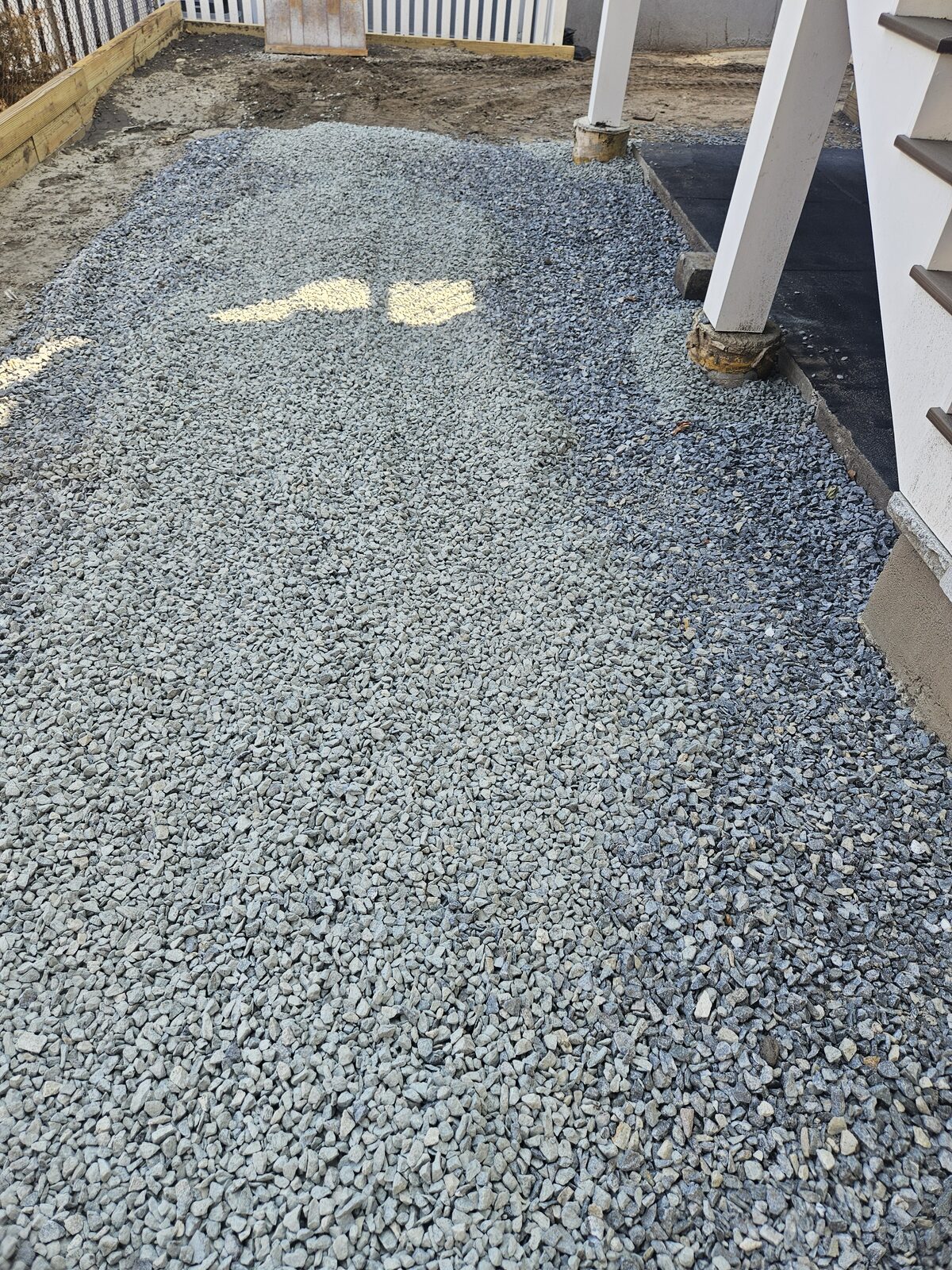 16-inch base excavation for a permeable driveway in Somerville, MA