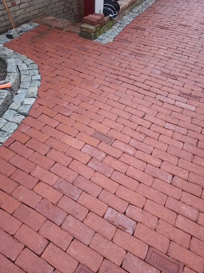 Red brick paver walkway with granite cobblestone border, Greater Boston